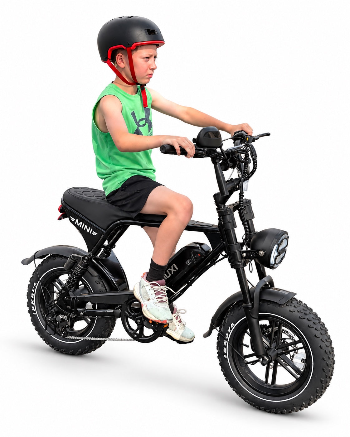 Evolve Mini black e-bike with young rider side view on white studio background